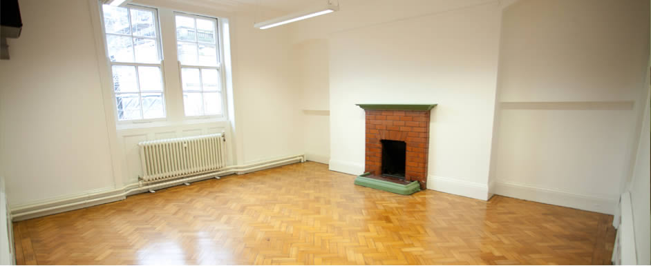 Ornate fire places and intricate coving have been restored by hand