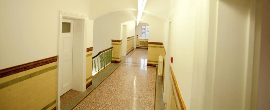 Original terrazzo floors adorn the corridors